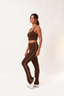 calça flare bicolor longévité marrom